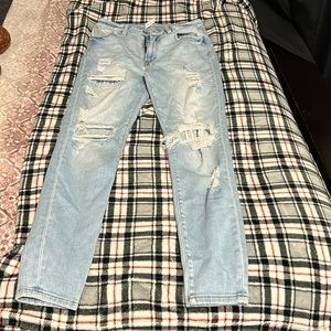 Light blue skinny jeans (covered holes)